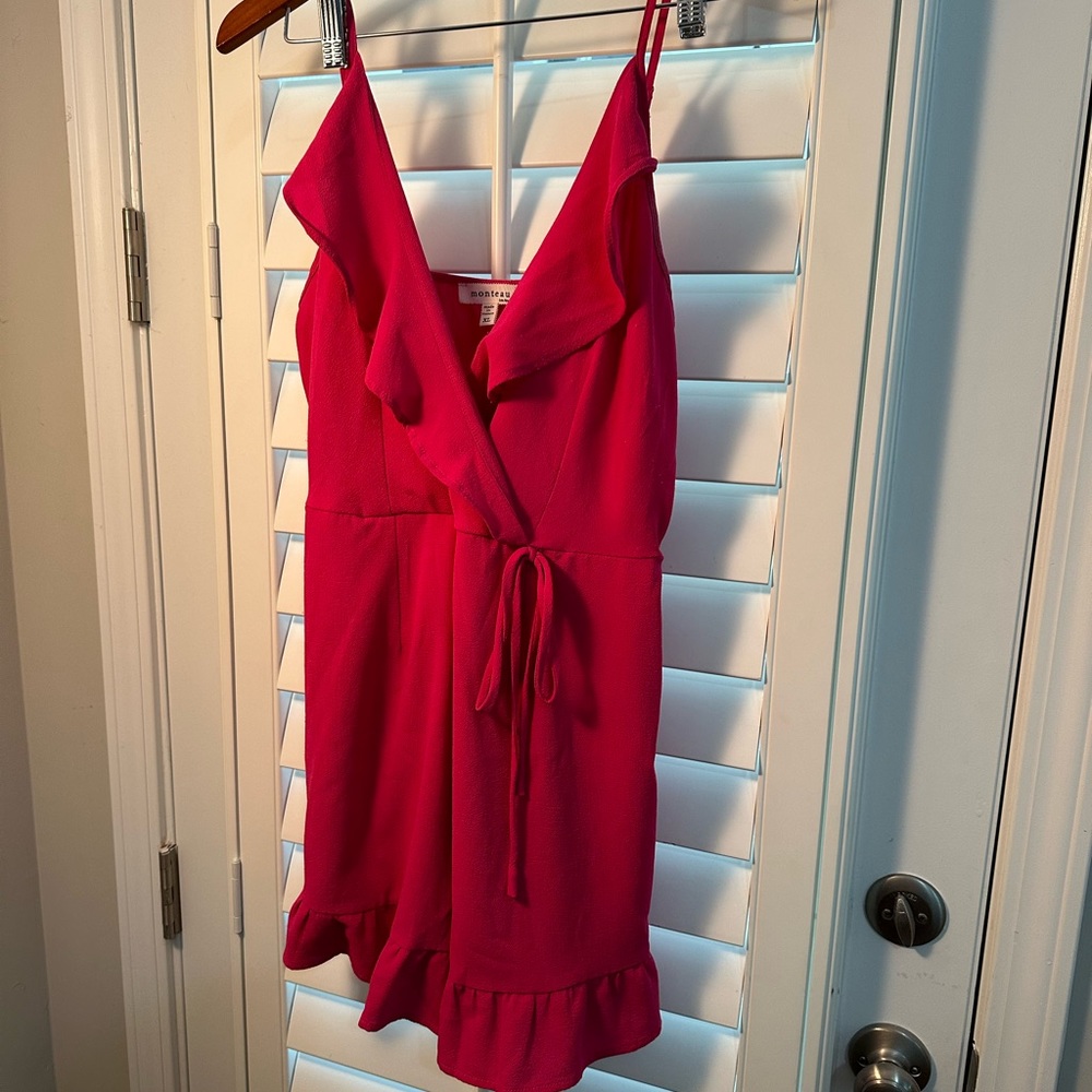 Adorable hot pink romper with ruffle detail